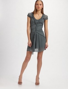 Swirls of tonal piping adorn this chiffon creation, detailed with cap sleeves, a sultry cutout back and frayed self-tie.Scoopneck Cap sleeves Allover tonal piping Center front pleats Cutout back Frayed tie-back About 32 from shoulder to hem Tonal rayon tank underlay Rayon; dry clean Made in Italy