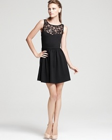 A pretty Aqua party dress designed with an elegant lace yoke is the perfect choice for the season's chicest happenings.