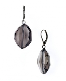 Chic drop earrings with flauntable fluidity. Nine West's plastic jet bead design has an organic look and feel. Set in silver tone mixed metal. Approximate drop: 1 inch.