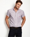 Play up pattern with this plaid woven shirt from Nautica.