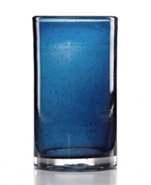 The eye-catching Iris highball glass makes a big impact in any setting with a cool slate-blue hue and tiny bubbles trapped in dishwasher-safe glass. From Artland.