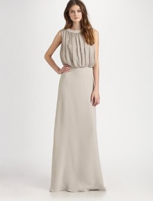 A regal design featuring a softly pleated silk top and a floor-skimming skirt.Jewel necklineSleevelessSoftly pleated topSide zipperButton back closureBack seamsSilk liningAbout 62 from shoulder to hem66% georgette/34% silk chiffonDry cleanImported Model shown is 5'10 (177cm) wearing US size 4. 