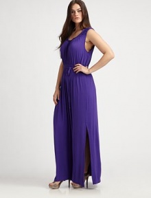 Made from soft, stretch modal this knit maxi dress features a feminine neckline, an elasticized waist and a curve-flattering self-tie belt. ScoopneckSleevelessSmocked waistSelf-tie beltCord endsAbout 46 from natural waist95% modal/5% elastaneHand washImportedAdditional Information Women's Salon Z Size Guide 