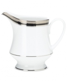 An instant classic, the Austin Platinum creamer from Noritake layers ribbons of black, patterned platinum bands and shimmering dots in white fine china.