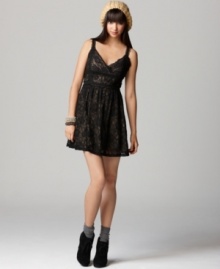 Sweetly sultry, allover lace lends a darkly romantic appeal to this Bar III dress -- style it with leather accessories to add edge!