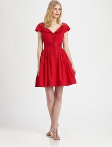 Flirty retro-chic in a full-skirted frock styled with a nipped waist and skin-baring back cutout.V necklineModified notch collarCap sleevesBust dartsButton-down frontPleated skirtBack V with button closureAbout 21 from natural waist98% cotton/2% spandexDry cleanMade in USA of imported fabricModel shown is 5'10 (177cm) wearing US size 4.