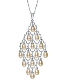 Illuminate your look. This exquisite chandelier pendant is adorned with cultured freshwater pearls (6-6-1/2 mm). Necklace crafted in sterling silver. Approximate length: 18 inches. Approximate drop: 2-1/4 inches.