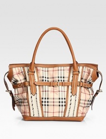 Famous checks trimmed with leather and finished with strips of distinctive macramé.Double top handles, 7 dropTop zip closeOne inside zip pocketTwo inside open pocketsCotton lining81% PVC/19% cotton12W X 13H X 6½DMade in Italy