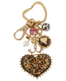 Betsey Johnson makes a heartfelt gesture with this key chain. Crafted from antique gold-tone mixed metal, the key chain features glass and glitter accents, as well as a leopard pattern heart to make it truly one to love. Item comes packaged in a signature Betsey Johnson Gift Box. Approximate drop: 1-3/4 inches.