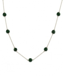 A few swirled green malachite gems (8 mm) collect across a 14k gold chain to create the perfect necklace to add a little pop of color to your wardrobe. Approximate length: 16 inches.