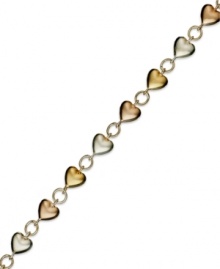 A romantic twist. Giani Bernini's tri-tone heart bracelet combines sterling silver, 24k gold and 24k rose gold over sterling silver. Approximate length: 7-1/4 inches.