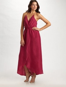 A bare and beautiful interpretation of the classic wrap gown in fluid silk.Crossover bodice front and back X-back spaghetti straps Elasticized waist Front crossover tulip skirt About 41 from natural waist Silk; dry clean Imported