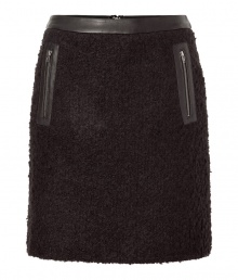 Stylish skirt in fine black arcylic-wool blend, with a hint of stretch - Fashionable leather trim at waist, and side zip pockets - Short mini-length - Fun piece for fall and winter with blouses, turtlenecks and sweaters - Try with opaque tights and ankle boots