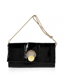 Perfect for carrying with festive cocktail frocks, Diane von Furstenbergs black snakeskin clutch is a contemporary choice packed with luxe appeal - Flap with mixed metal magnetic logo engraved circle clasp, removable gold-toned chain strap, inside zippered back wall pocket - Team everything from cocktail dresses and flats to evening gowns and statement heels