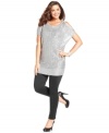 Show off your shimmer in DKNYC's plus size tunic sweater, featuring a cold shoulder design and sequined finish-- it's holiday party-perfect!