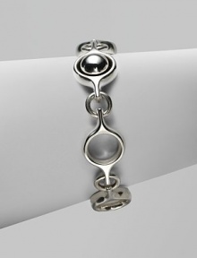 An unique and modern design featuring sterling silver spherical and circular links. Sterling silverToggle closureLength, about 7½Imported 