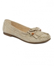 Hippie couture. With a fringed tongue and little beaded bow, the Teana flats by Steve Madden combine the comfy cuteness of moccasins with the versatility of ballet flats.