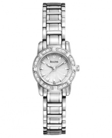 Classic elegance for the modern woman: the Dress collection watch from Bulova is adorned with diamond accents swirling around the dial.