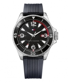 Put on your game face and don't forget this sleek black sport watch by Tommy Hilfiger. Ribbed black silicone strap and round silvertone mixed metal case. Black turning bezel with numerals and stick indices. Black dial features luminous stick indices, silvertone numerals at twelve, three, six and nine o'clock, date window at three o'clock, luminous hands and iconic flag logo. Quartz movement. Water resistant to 30 meters. Ten-year limited warranty.