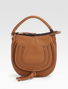 Delicate braiding and a woven top-handle add rustic appeal to this rich leather design, crafted in a sleek flap-front silhouette.Top handle, 8½ drop Top zip closure Outside open pocket under front flap One inside zip pocket Cotton lining 10W X 11H X 2½D Made in Italy