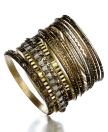 Stackably chic. Style&co.'s set of 16 bangles creates a luminous glow with textured and smooth bangles in gold and aluminum tone mixed metal. Approximate diameter: 2-3/4 inches.