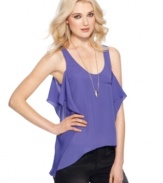 Side ruffles and an asymmetrical hi-lo hem adds edge to this BCBGeneration tank -- perfect over the season's skinny jeans!