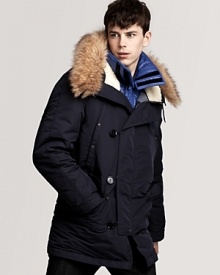 A cozy parka with a cozy faux fur-trimmed hood and a detachable, lightly-quilted long sleeve lining, which can be worn alone.