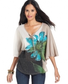 A breezy silhouette and pretty floral print make Style&co.'s top flirty, femme and perfect for dressing up jeans!