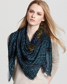 Go on an expedition in Burberry's exotic scarf, rendered in bold shades of blue, teal and mustard.