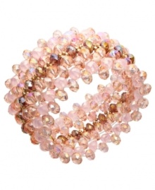 Every girl needs a little extra pink. c.A.K.e. by Ali Khan's pretty beaded bracelet features rows of glass crystals (6 mm) in shimmery pink hues. Set in mixed metal. Approximate diameter: 2-1/4 inches.