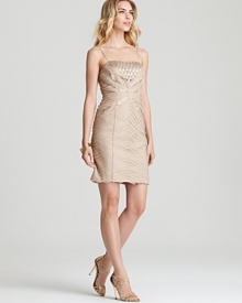 Delicate chiffon trickles along Sue Wong's glamorous, beaded dress, a standout style with timeless appeal.