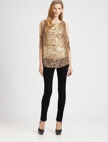 Rock the bold-shoulder trend in this sequined, silk-rich blouse with a lavish leopard print, split shoulders and airy silhouette. RoundneckSplit three-quarter sleevesLonger length hits below the hipsBody: SilkTrim: 62% viscose/35% polyethylene/3% elastaneDry cleanMade in USA of imported fabricModel shown is 5'10 (177cm) wearing US size Small.