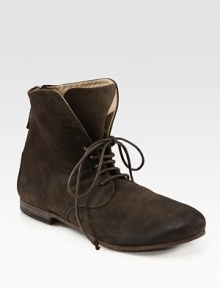 Rustic suede style with a lace-up front and an exposed back zipper. Suede upperBack zipperLeather lining and solePadded insoleMade in ItalyOUR FIT MODEL RECOMMENDS ordering one half size up as this style runs small. 