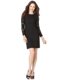 Suzi Chin's sleek black dress features a fishnet-like lace overlay that's sheer only at the sleeves-a touch that's a tad flirty but completely sophisticated.