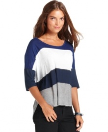 Colorblocked stripes make a big impact on a chic, relaxed silhouette in this look from Calvin Klein Jeans. Pair it with skinny jeans for an of-the-moment outfit.