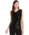 Calvin Klein's sequined top will add the perfect dose of shimmer to a special ensemble.