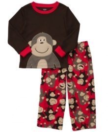 One little monkey jumping on the bed. Start his dream time with a little bit of fun in this comfy fleece shirt and pant sleepwear set from Carter's.