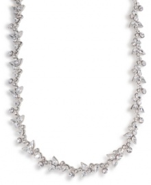 Add a hint of glitter to your neckline for an extra special touch. Carolee necklace features a floral design crafted in sparkling clear crystals. Set in mixed metal. Approximate length: 16 inches + 2-inch extender.