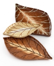 Celebrate the earth with the simple leaf shapes, rich fall palette and eco-friendly papier-mache that define Spice nesting trays. Handmade by Haitian artisans, it's a unique and beautiful way to top a table.