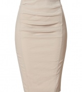 The ultimate pencil skirt, this flattering Donna Karan favorite will keep you turning heads while maintaining comfort - Pencil silhouette, front draped pleating, seaming details, back slit, concealed back zip closure - Pair with a silk blouse, fishnets, and platform pumps