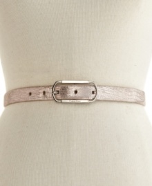 The metallic look of this Calvin Klein skinny leather belt creates a mesmerizing feel to any outfit.