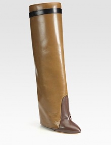 Sleek multicolored boot of supple leather, with a unique fold-over cuff and hidden lacquered wedge. Lacquered wedge with covered leather flap, 6 (150mm)Shaft, 19¾Leg circumference, 13½Leather upperPull-on styleLeather lining and solePadded insoleMade in Italy