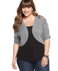 Add a sassy layer to your look with Extra Touch's elbow sleeve plus size cardigan, featuring lace detail.