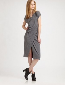 Supremely soft scoopback dress has a crossover v-neck, asymmetrical draping and a sultry front slit. Crossover v-neckShort sleevesFront slitScoopbackAbout 22 from natural waist52% viscose/22% polyamide/18% wool/8% elastaneDry cleanMade in ItalyModel shown is 5'10 (177cm) wearing US size Small.