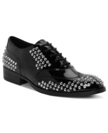 Borrowed from the boys–but way cooler. The Brogue oxford flats from Truth or Dare by Madonna feature high-contrast black and white patent and all-over stud details.