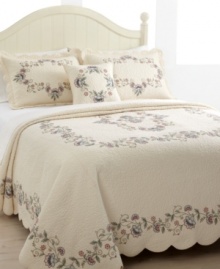 Sleeping beauty. Delicately embroidered blossoms and meandering vines embellish cloud-like quilting for a look of enchantment. Finished with scalloped edges.