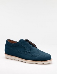 A more casual, easy-wearing fit for the classic wingtip, complete with perforated trim and Goodyear welt soles for added ventilation, strength and comfort. Suede Leather lining Padded insole Goodyear welt rubber sole Imported 