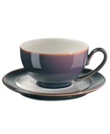 A true gem, the Amethyst wide-rimmed saucer is simply glazed but boldly hued, in deep indigo and crisp white from Denby's collection of dinnerware. The dishes can embrace their luxe color alone or they can be paired with the playful dots of Amethyst Stone for a well-balanced and uniquely customized table setting.