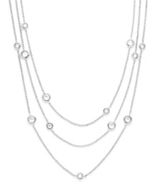 Inch upon inch of brilliant sparkle. Eliot Danori's elegantly-layered necklace highlights bezel-set cubic zirconias (2-3/4 ct. t.w.) strung from delicate chains. Crafted from silver tone mixed metal. Approximate length: 54 inches.