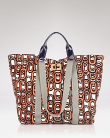 Substantially-sized to keep you equipped for excursions, this DIANE von FURSTERNBERG tote flaunts a mod-inspired print. Sling it over a caftan and wedges for cool when you island-hop.